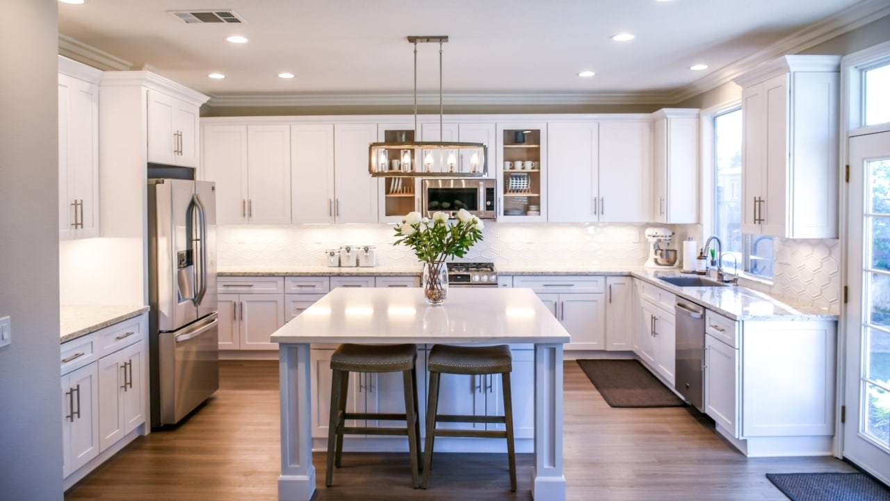 Image of modern new kitchen with white cabinetry