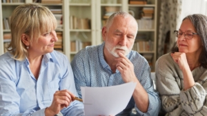 A couple talking to a sales consultant for other options