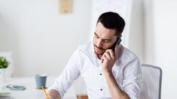 A man calling using his phone