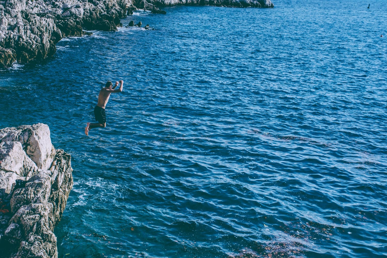 cliff-jumping-into-water