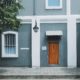 gray-house-with-wooden-door