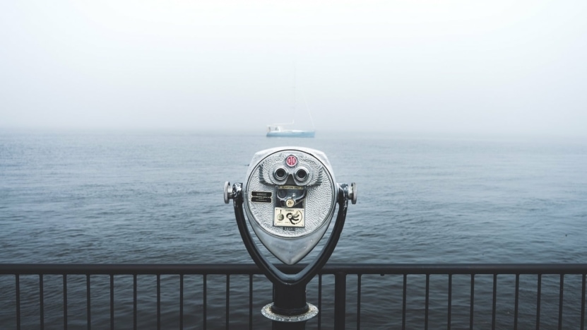 binoculars-looking-into-ocean