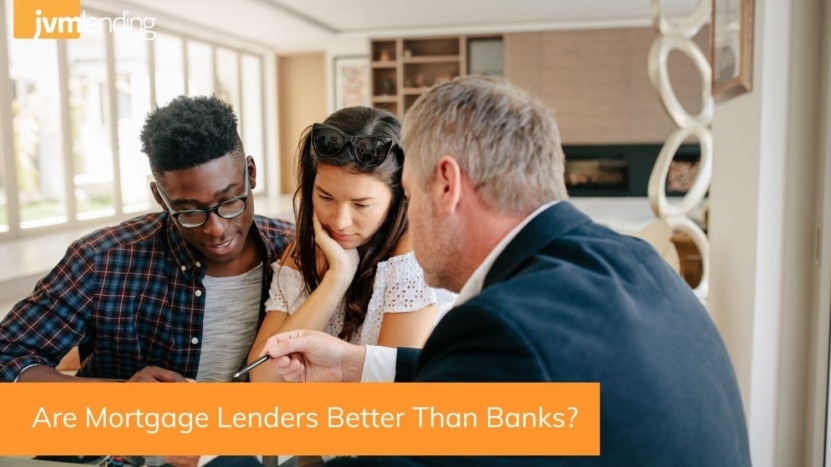 Homebuyers review a mortgage application with their local mortgage lender. Local lenders are often the best option for helping clients purchase or refinance a home.