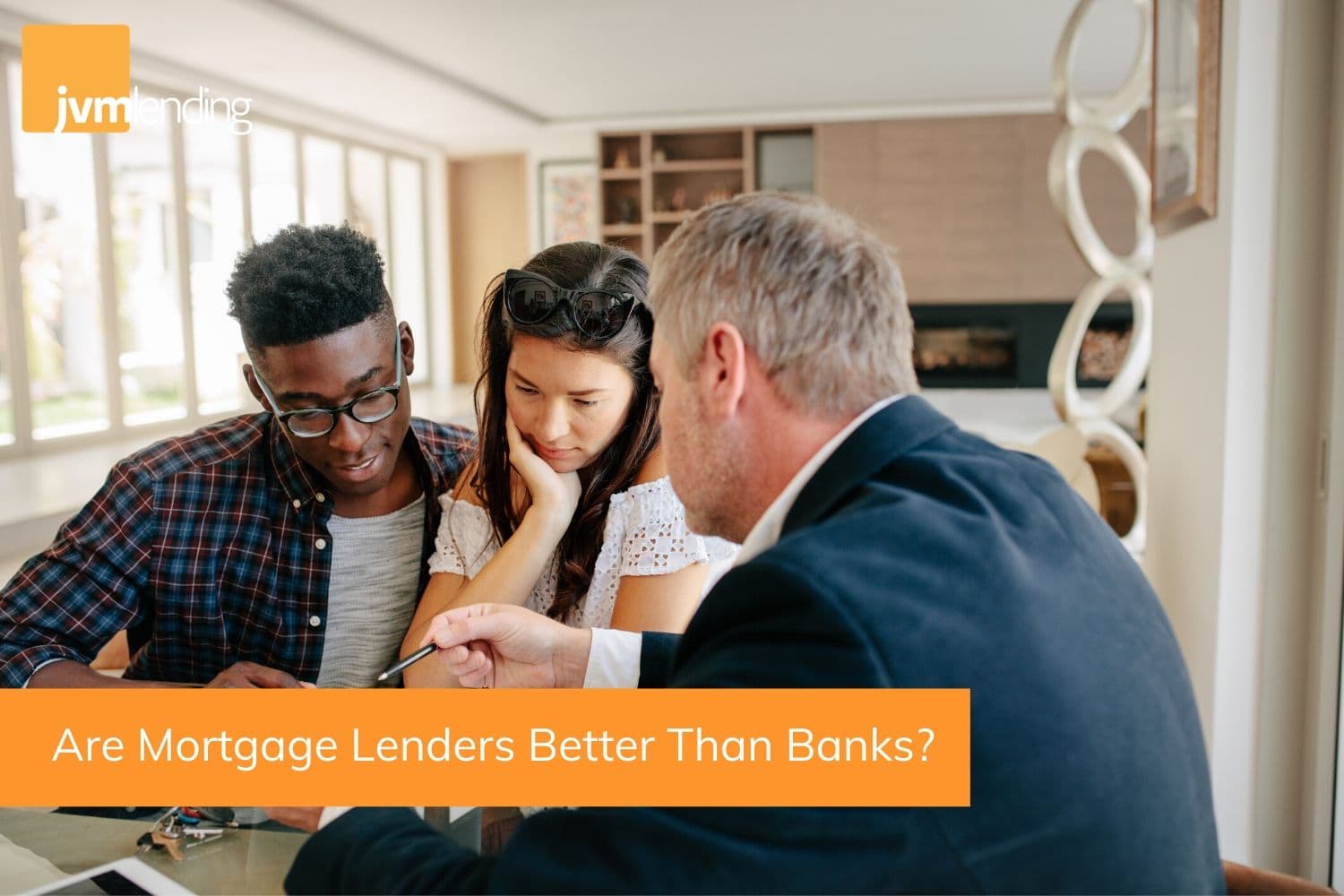 Homebuyers review a mortgage application with their local mortgage lender. Local lenders are often the best option for helping clients purchase or refinance a home.