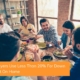 A group of friends celebrate the new homebuyers in their group with a dinner party. First-time homebuyers can purchase property with less than 20% down payment.