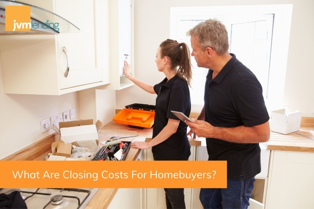 A young homebuyer looks at the kitchen with a home inspector and reviews repair costs that she will need to add into her total closing costs for the home.