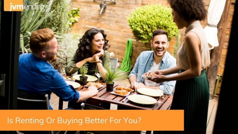 A group of people have an outdoor dinner party to celebrate their friends who just finished buying a house after renting for years.