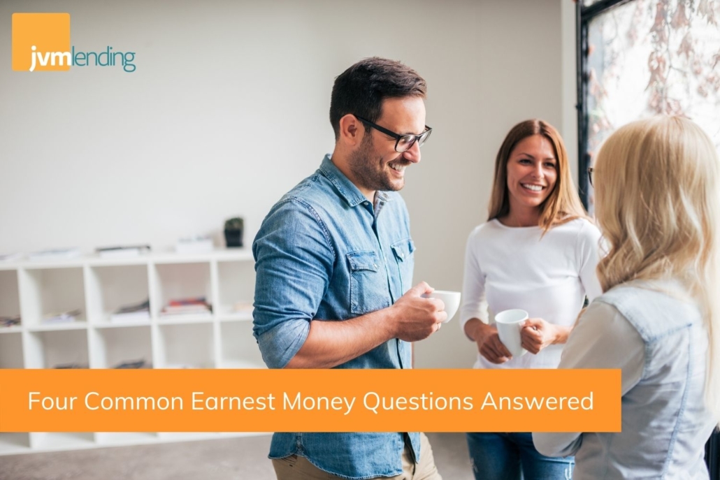 three business professionals stand in a bright room and discuss common questions about earnest money