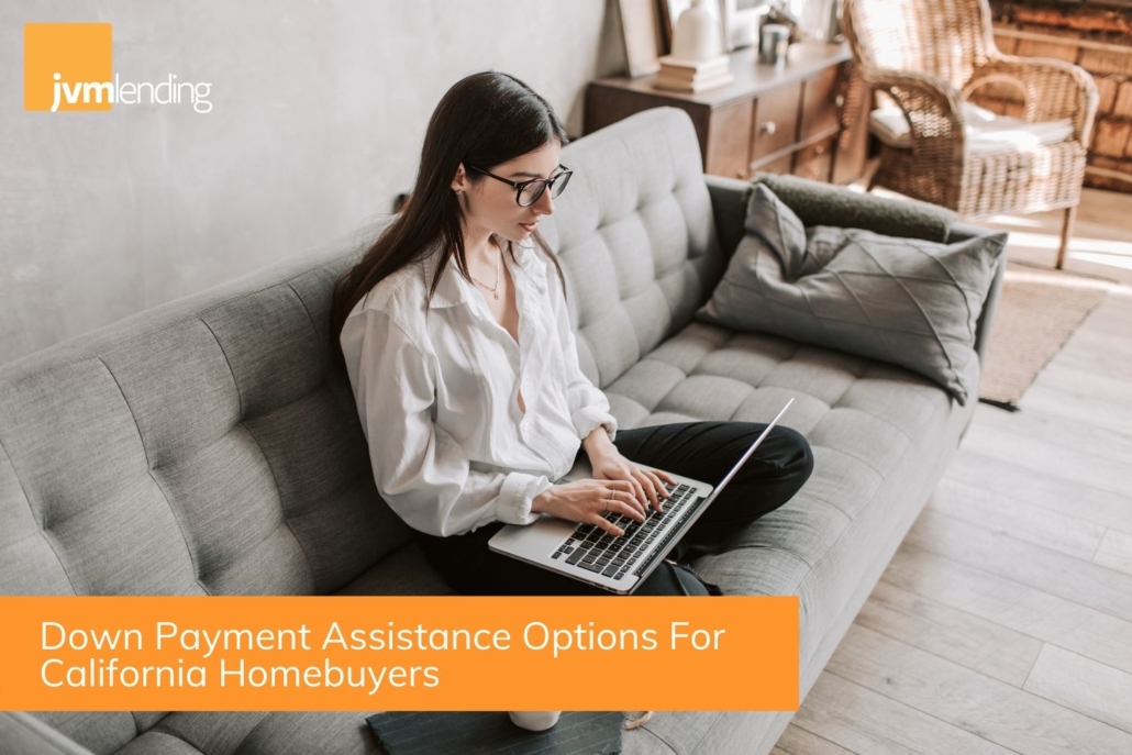 A prospective homebuyer in California researches down payment assistance programs on her laptop computer at home.