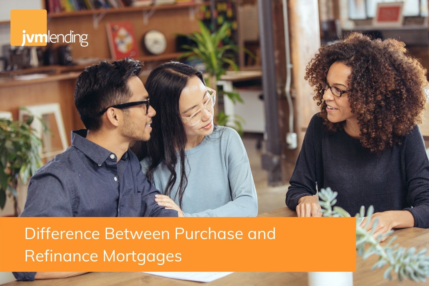 An Asian couple sits with a reputable lender to discuss their purchase mortgage and refinance opportunities.