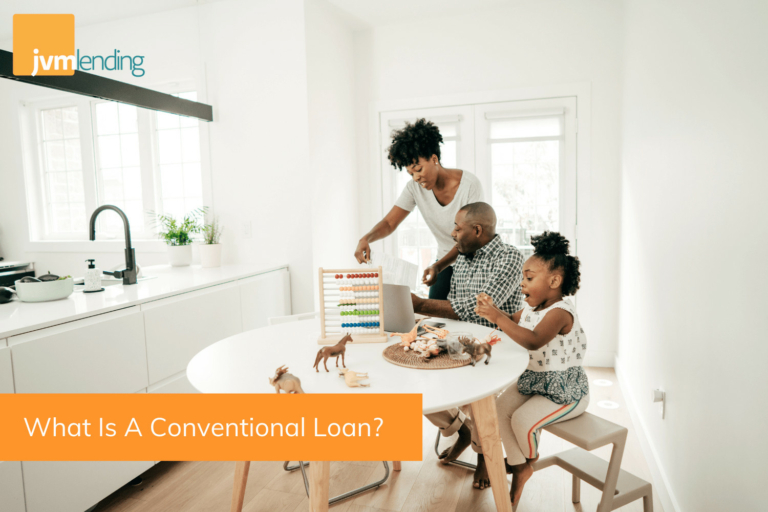 A young family sits at a kitchen while they discuss if they use a conventional loan to purchase a home.