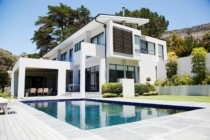 White modern home with swimming pool