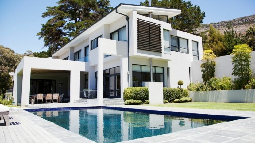 White modern home with swimming pool