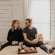 A couple has breakfast in bed of the new home that they purchased despite the recent shortage of housing inventory due to hedge funds purchasing more homes.