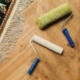 Paint Rollers Lying on a Wooden Floor During A Home Renovation