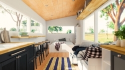 A kitchen and living room in a tiny ADU home