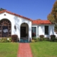 A house in San Jose, California with red tile roof and brick walkway