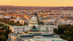 A sunset view of the U.S. Capitol building in Washington, D.C., symbolizing government activity and policy debates.