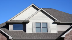 A picture of a house with the sky as the background