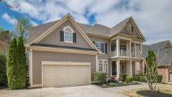 A picture of a house with a nice front view