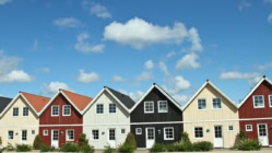 A picture of several houses lined up together