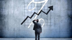 man looking at rates going up.