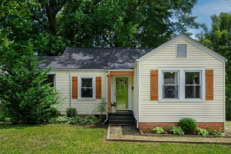 Large Luxury Suburban Home Beautiful Landscaped Lush Green Front Yard Lawn Trees