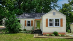 Large Luxury Suburban Home Beautiful Landscaped Lush Green Front Yard Lawn Trees