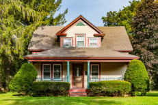 typical wooden small farm house in victorian style